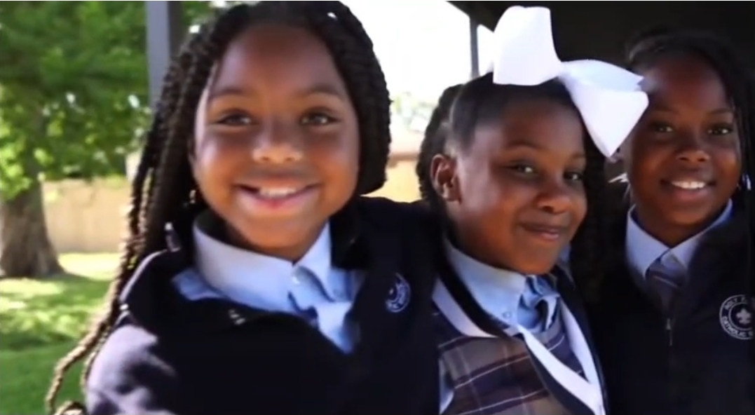 Holy Family Catholic School students smiling